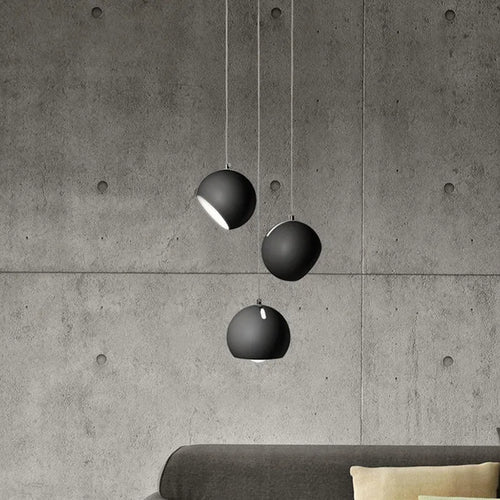 Post-modern ball chandelier table lamp in Moon White or Obsidian Black finish, available in single-head or three-head configurations.
