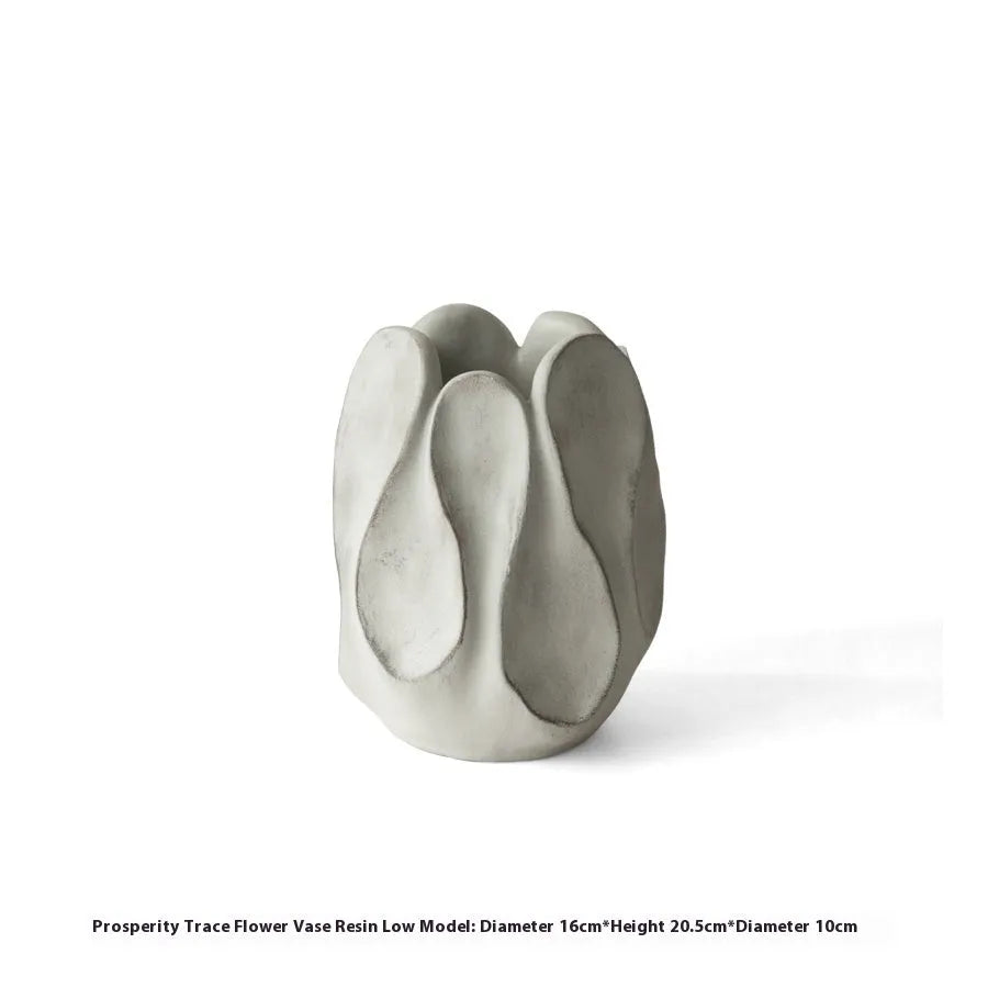 Irregular ceramic vase for flower arrangements in handcrafted design