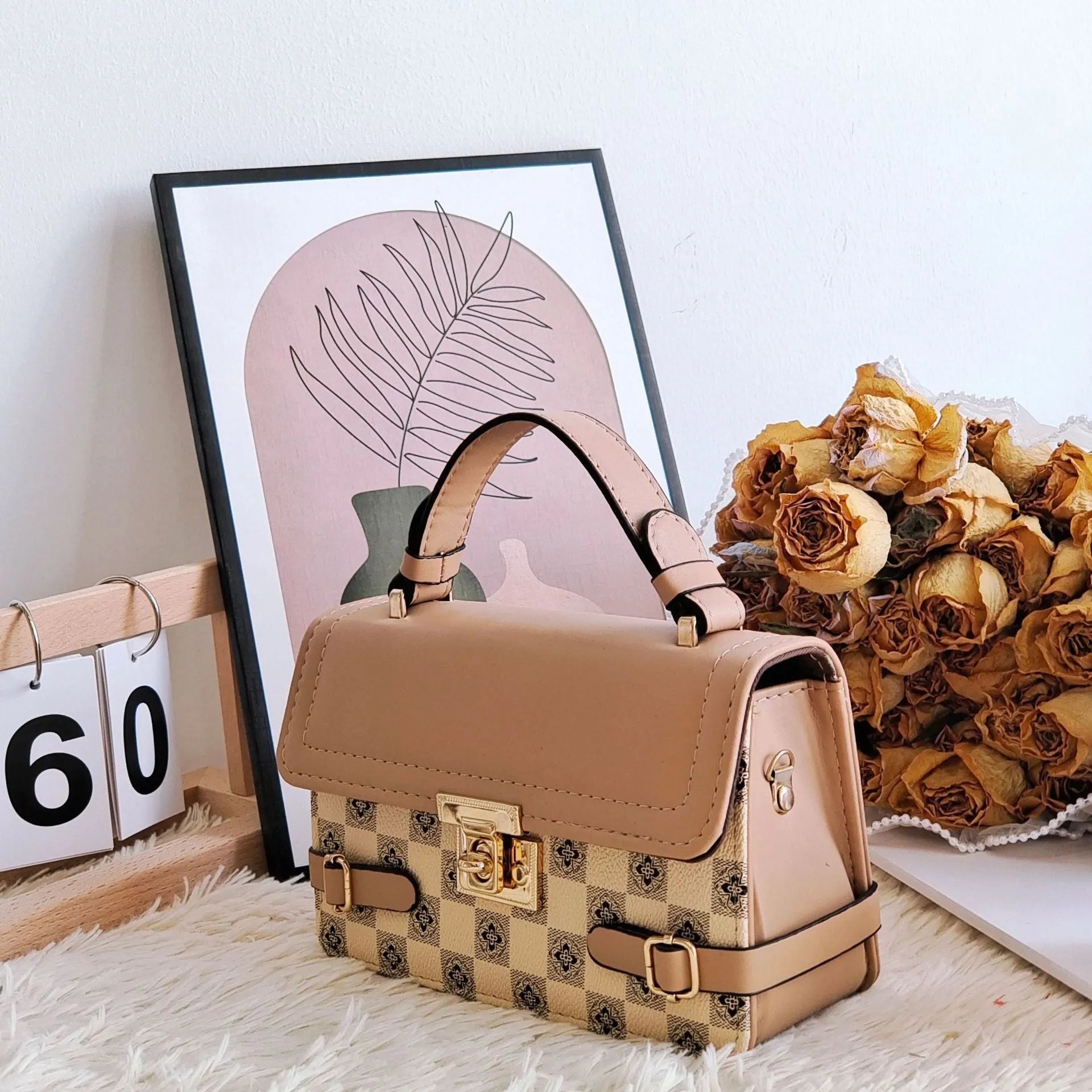 Retro square crossbody bag with ethnic floral stitch patterns and horizontal suitcase shape