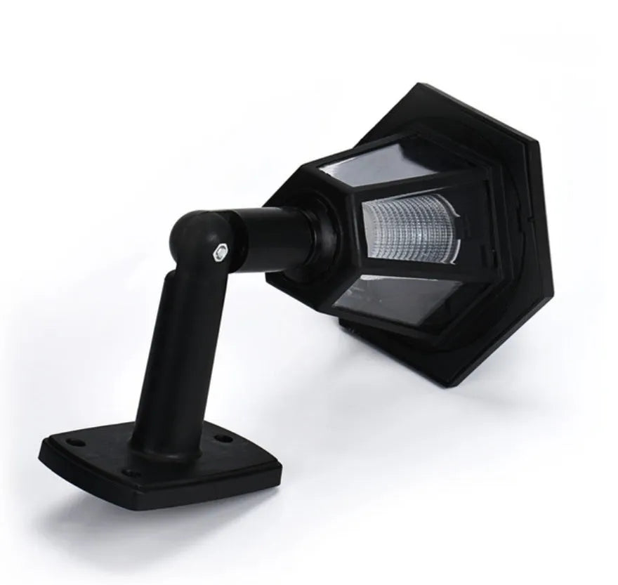 Black hexagonal solar wall light with IP44 waterproof rating for outdoor use