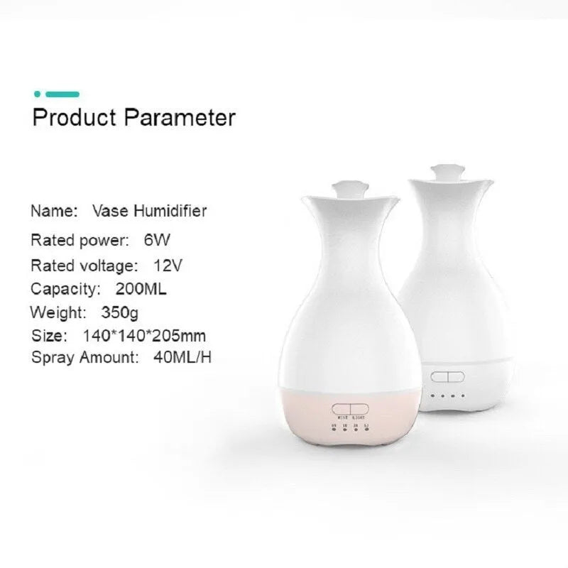 White ultrasonic aromatherapy diffuser and humidifier with colourful LED light misting on a wooden table.