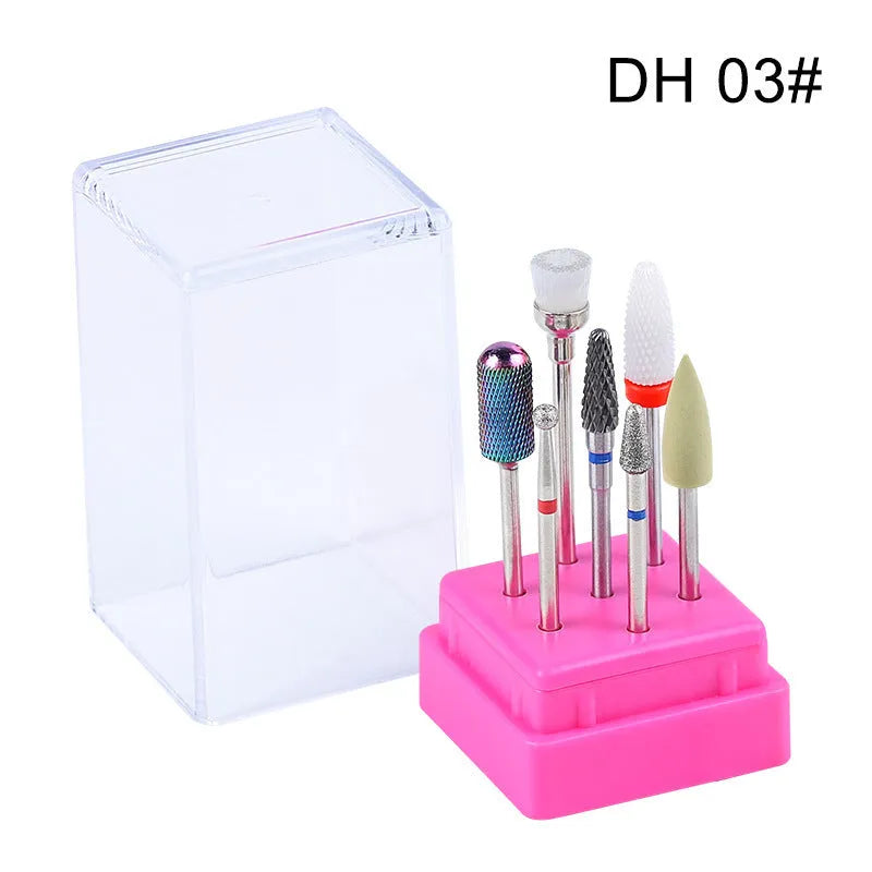 Set of seven tungsten steel nail drill bits and a brush in a clear plastic case.