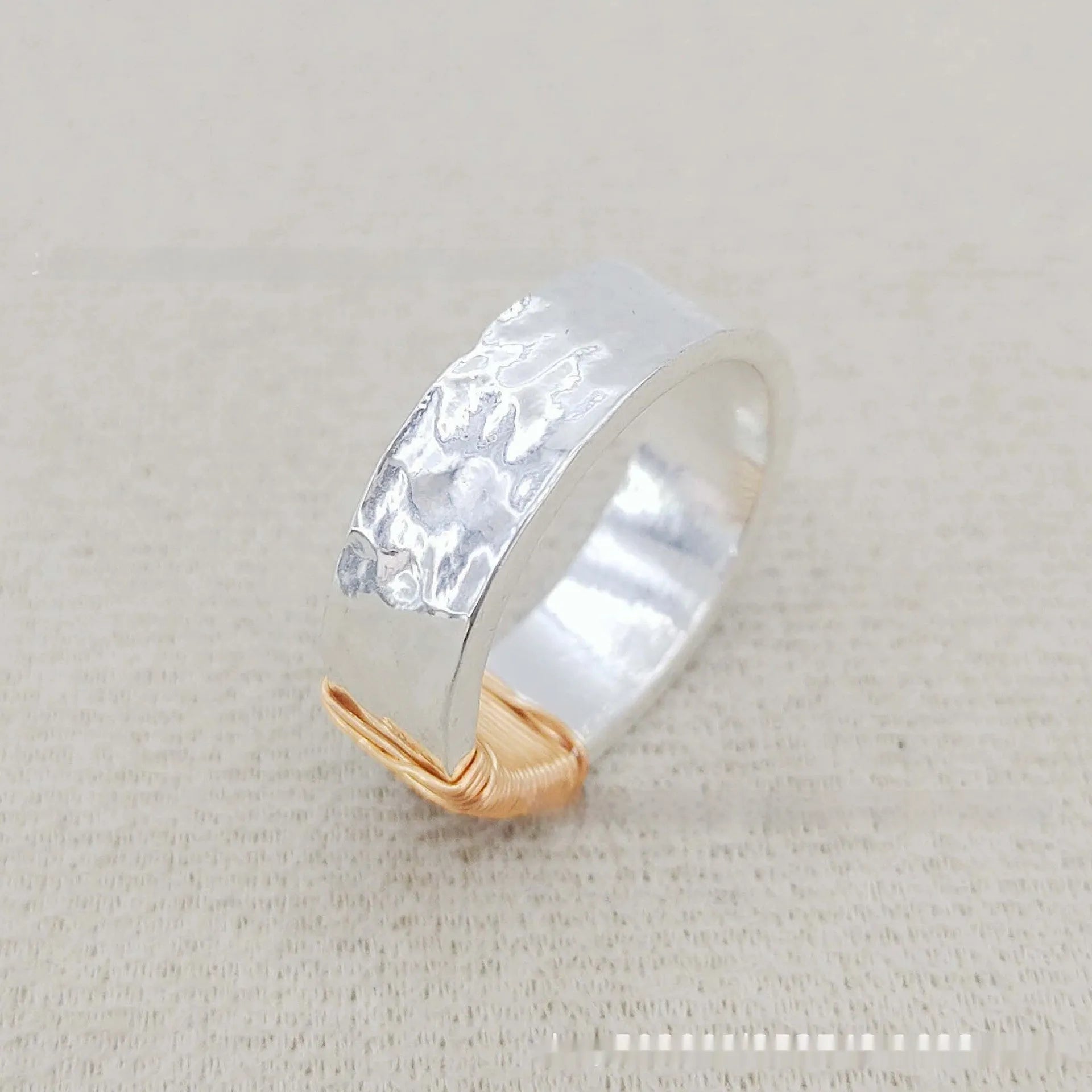 Geometric copper ring bracelet with irregular coil design in silver gold finish