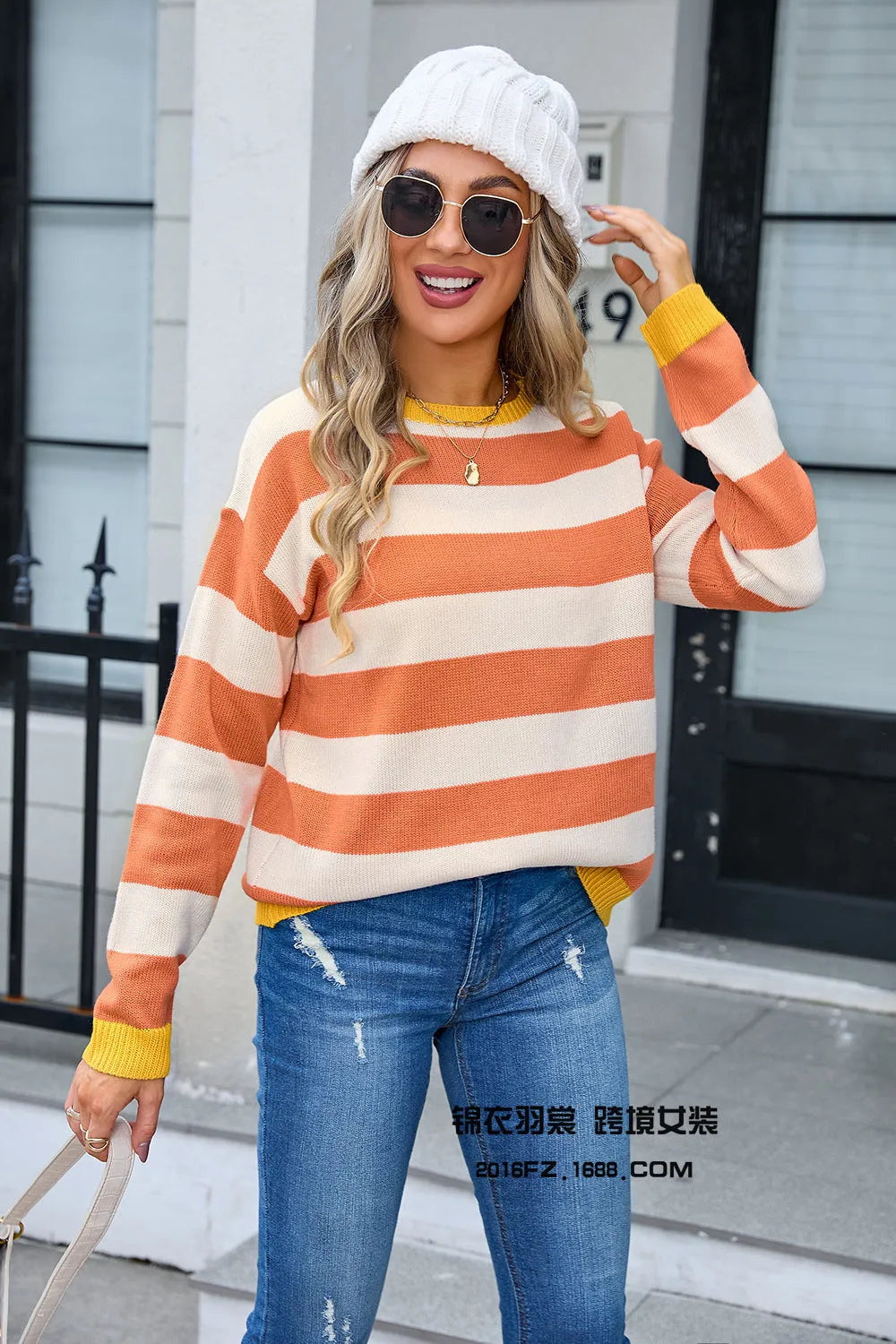 Women's loose fit acrylic sweater in multiple colours with round neck and long sleeves