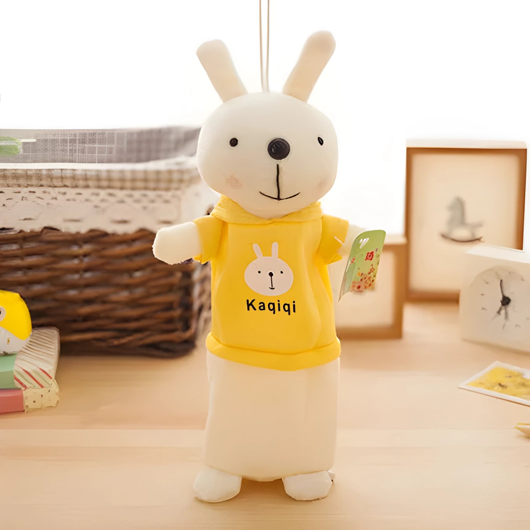 Large soft plush rabbit pencil case in multiple colours, shown with pens inside, dimensions 30cm by 14cm.