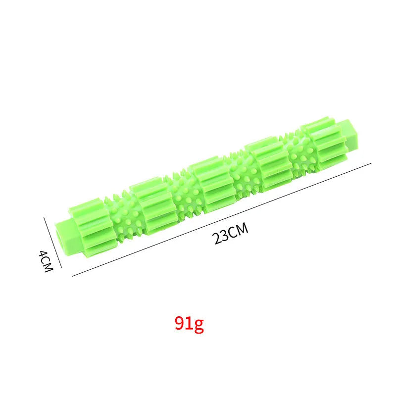 Green durable rubber dog chew toy with treat-dispensing hole and squeaker, for aggressive chewers.