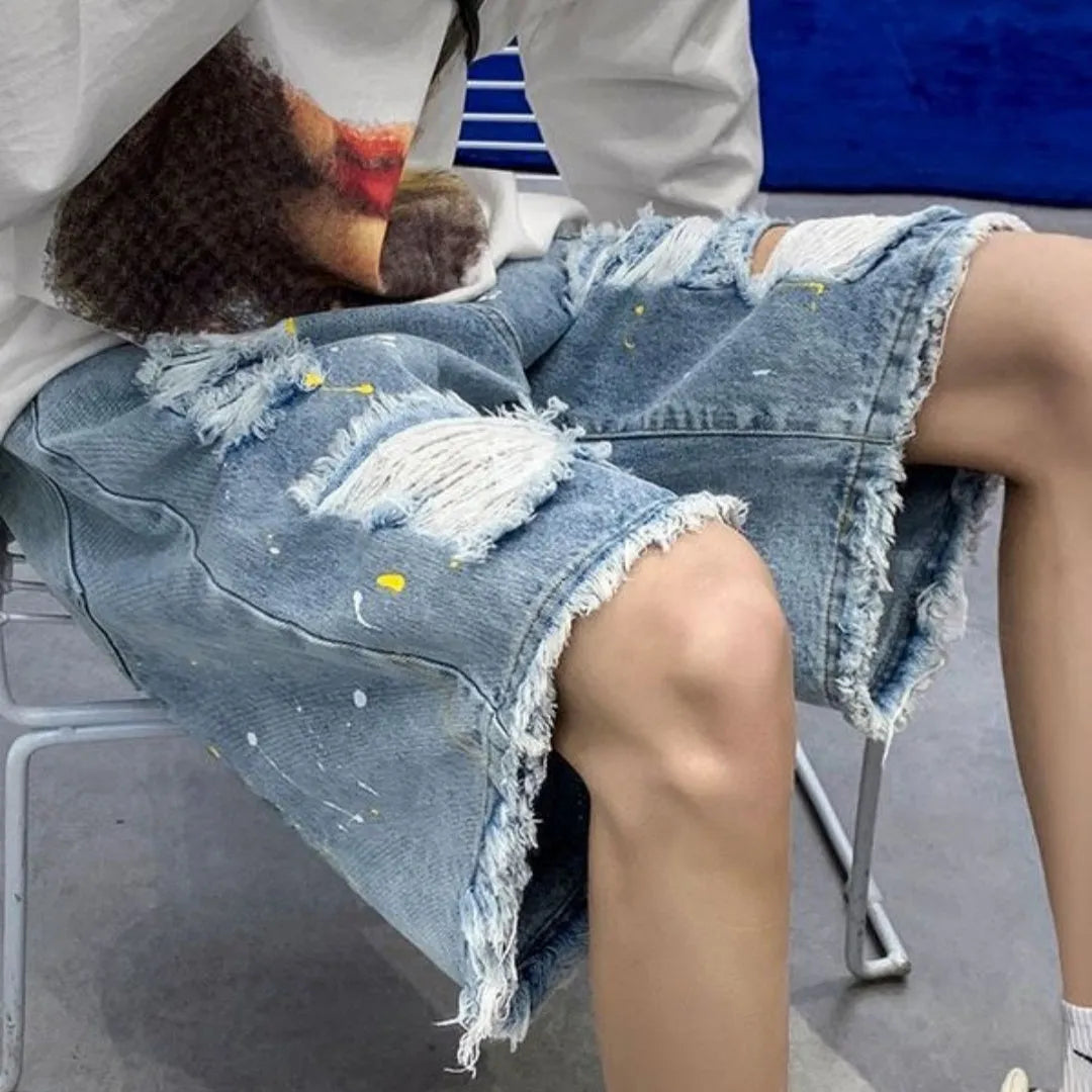 Men's casual water washed denim shorts with hole detailing and loose street style fit