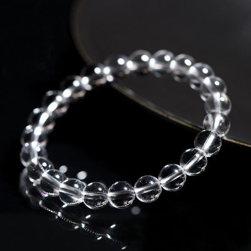 Natural Donghai old mine white crystal geometric bracelet with round beads.