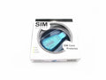 Blue USB mobile phone SIM card reader for data backup and editing on computer.