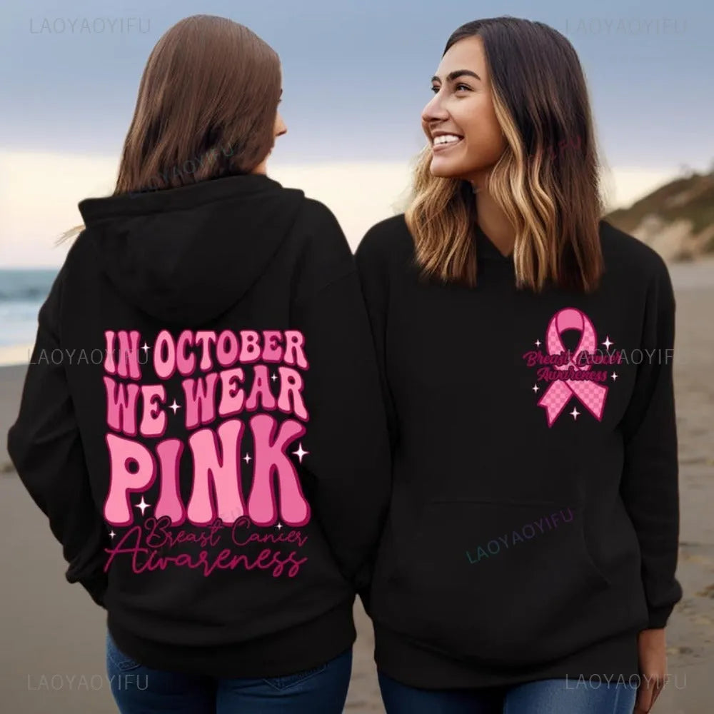 Breast cancer awareness hoodie with retro art pattern and side seam pockets in pink colour.