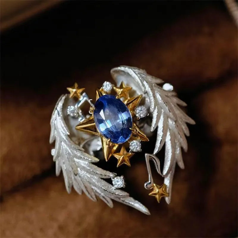 Adjustable geometric open-mouth ring with oiled alloy finish
