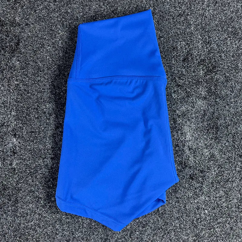 Ladies high-waisted yoga shorts in nylon fabric, shown in one of 16 available colours.