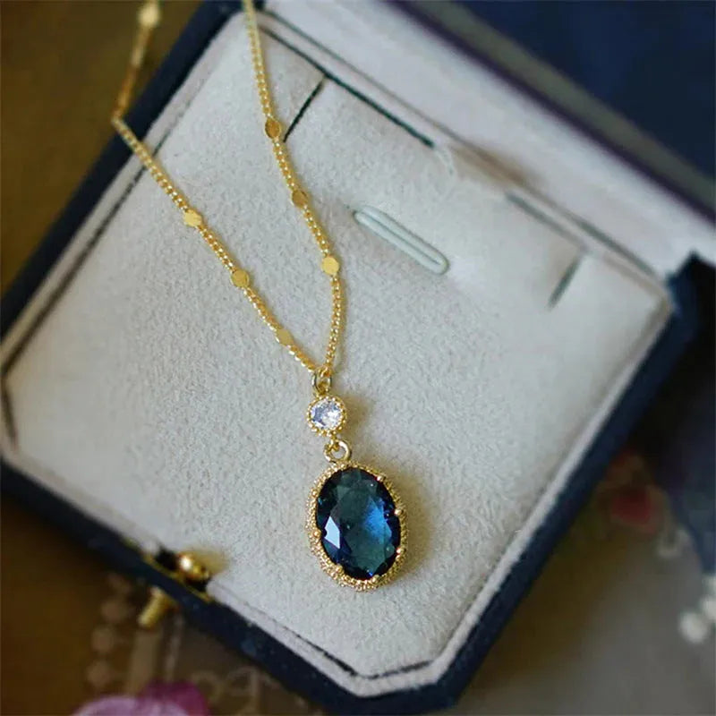 Gold geometric copper pendant on a French retro unisex necklace.