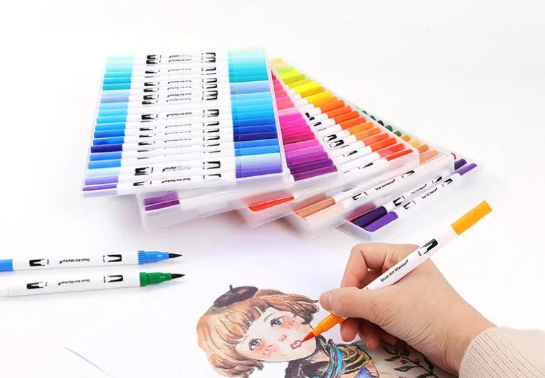 Set of watercolour pens with vibrant coloured barrels for drawing and painting.