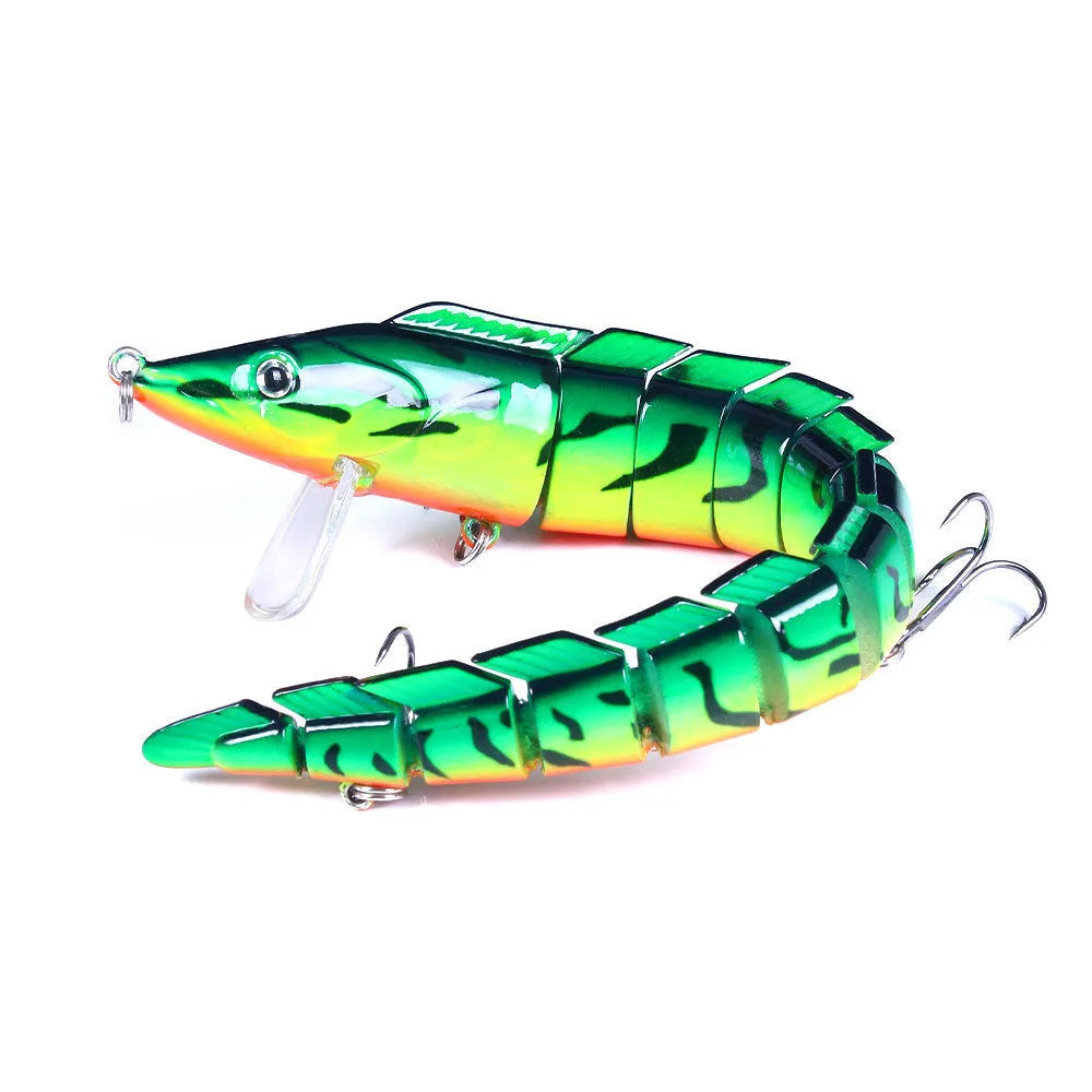Multi-section soft plastic loach fishing lure showing articulated design and natural colour pattern