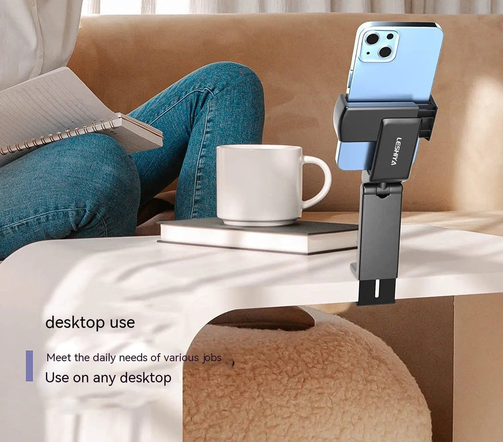 Foldable rotating universal phone holder in black, gray, or green colours on a flat surface
