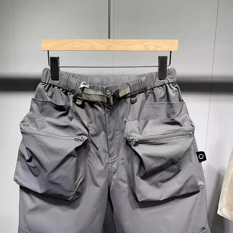 Large size men's black work shorts with pockets and straight leg hem