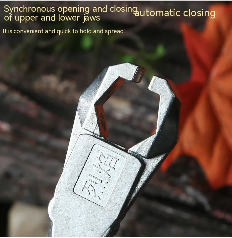 Close-up of alloy archery release aid showing two-axis harpoon clip mechanism with zinc alloy construction
