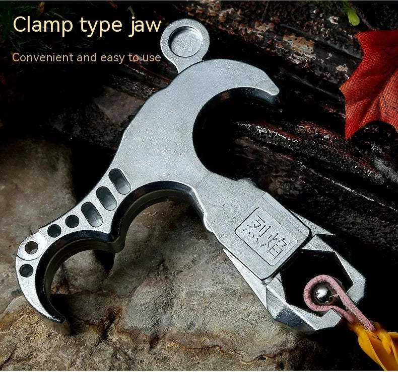 Close-up of alloy archery release aid showing two-axis harpoon clip mechanism with zinc alloy construction