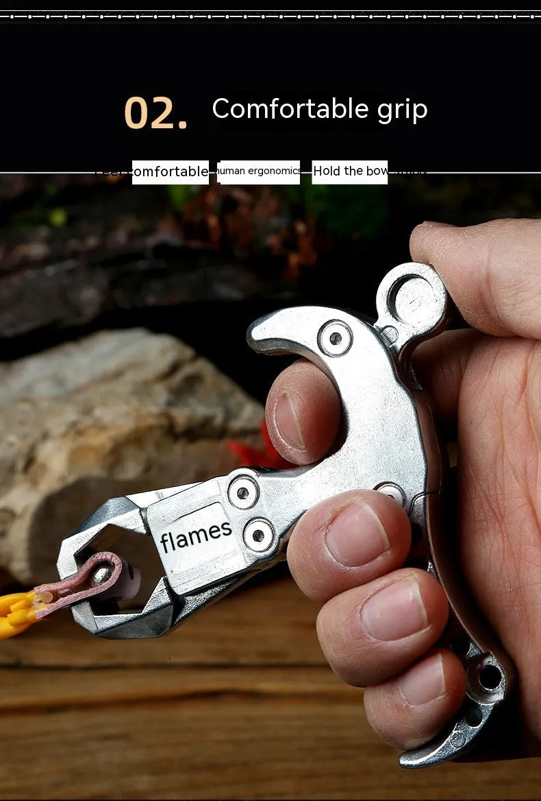 Close-up of alloy archery release aid showing two-axis harpoon clip mechanism with zinc alloy construction
