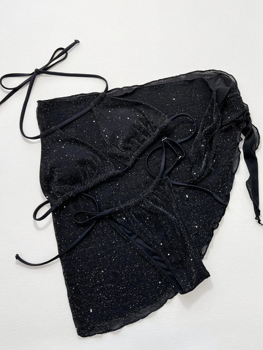 Black three-piece bikini swimsuit set with matching top and shorts on Asian sizing mannequin