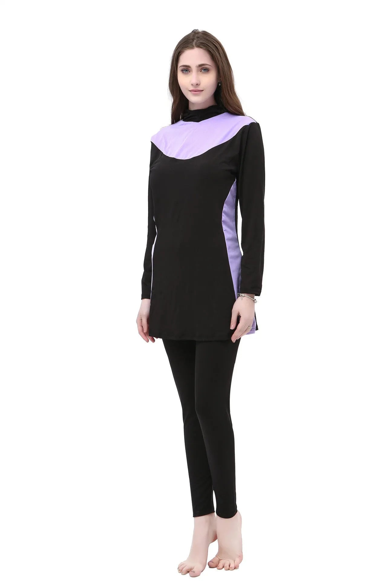 Women's black long sleeve hooded swimsuit with separate pants, shown on a model.
