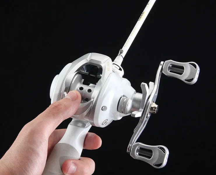 Small white micro baitcasting fishing reel with drip wheel mechanism