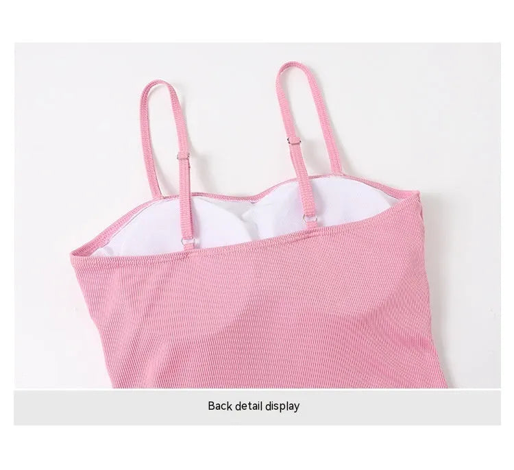 Women's long-sleeve one-piece swimsuit in pink and black colours