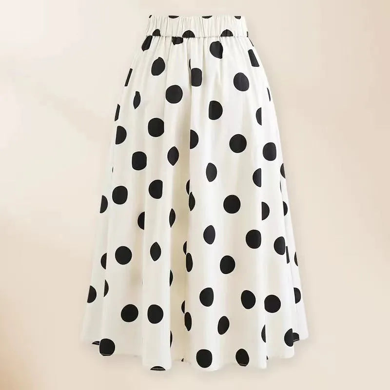 Women's one-piece swimsuit with beach dress style featuring bow detail and round skirt in polyester fabric