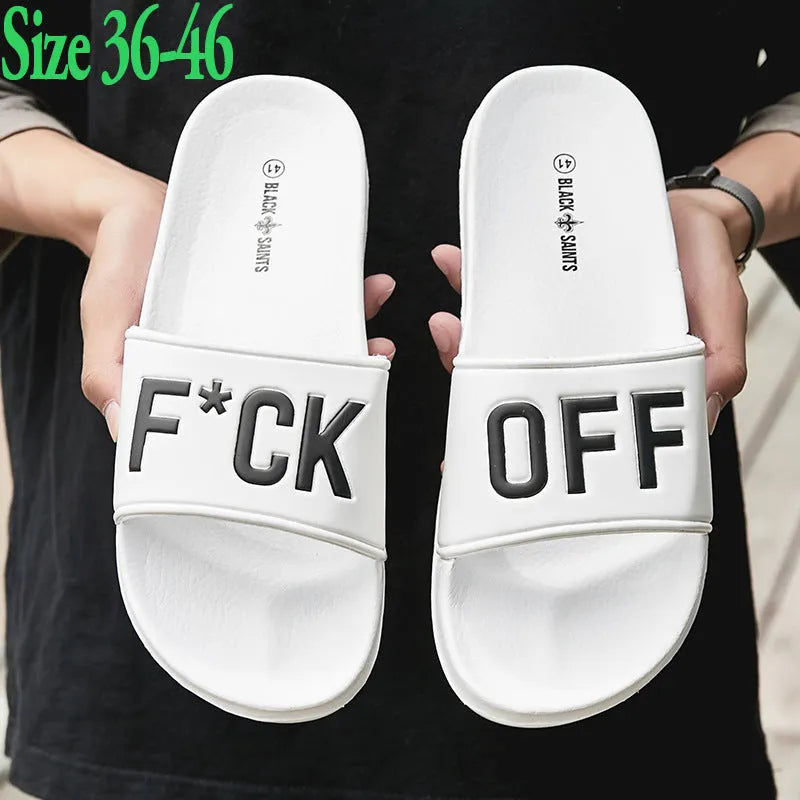 Men's black open-toe slippers with rubber soles showing personalised detail