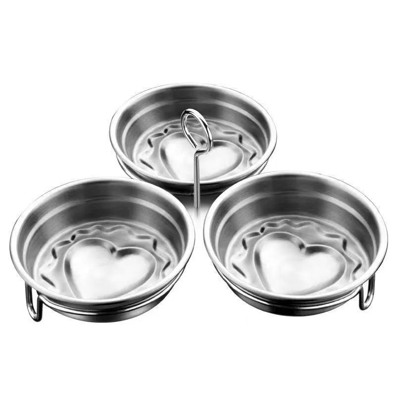 Mini stainless steel egg steamer in heart-shaped design with compact kitchen appliance dimensions