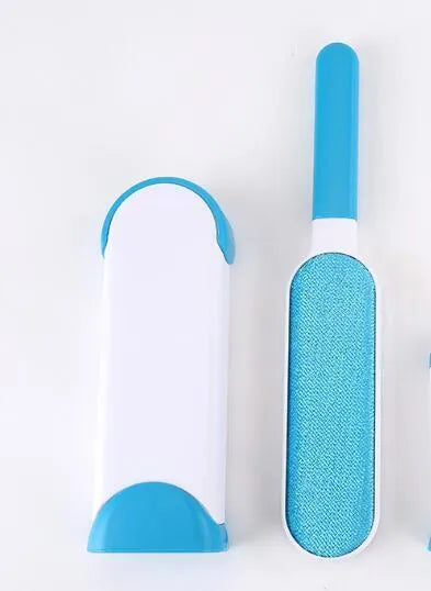 Blue reusable pet hair removal comb with a double-sided sticky brush and self-cleaning base.