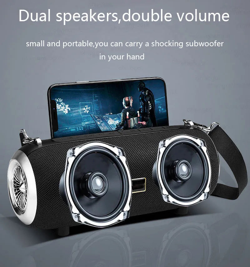 F666 square portable Bluetooth speaker with fabric mesh front, shoulder strap, and FM antenna.