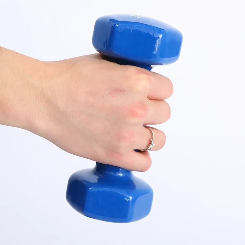 Bright coloured plastic fitness dumbbells with glossy finish in various weights for floor-safe exercise