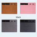 Pink wireless charging mouse pad with integrated phone holder on a desk, showing 320 x 260 mm size.