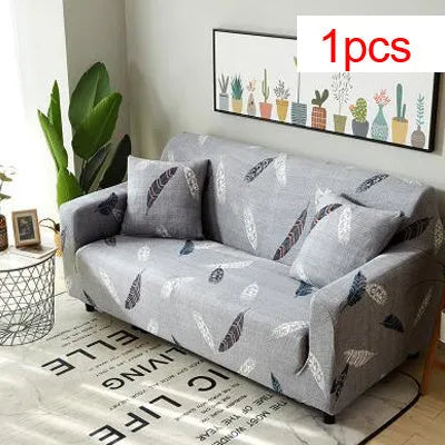 Geometric abstract printed stretch sofa slipcover covering a three-seater sofa with matching cushion covers.