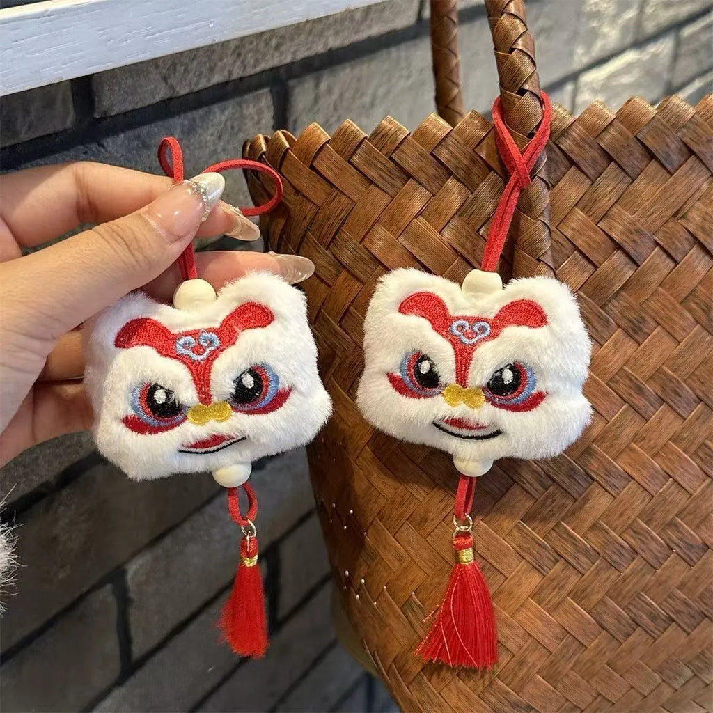 Handmade Chinese style plush lion tassel keychain ornament with star stone detail in blue colour