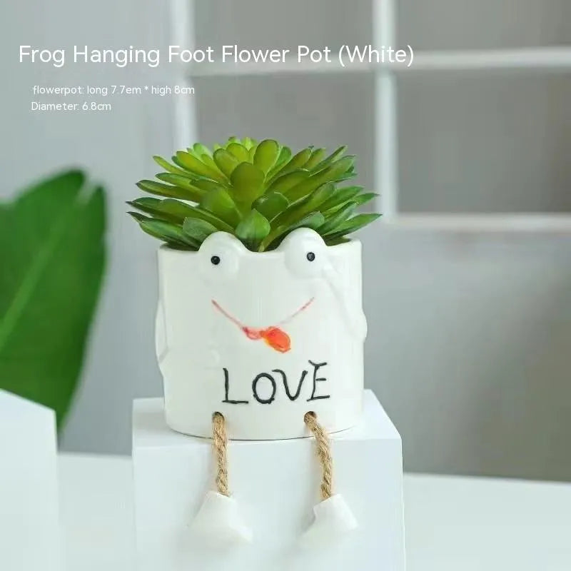Ceramic hanging foot flowerpot with cartoon design for succulent plants on desktop