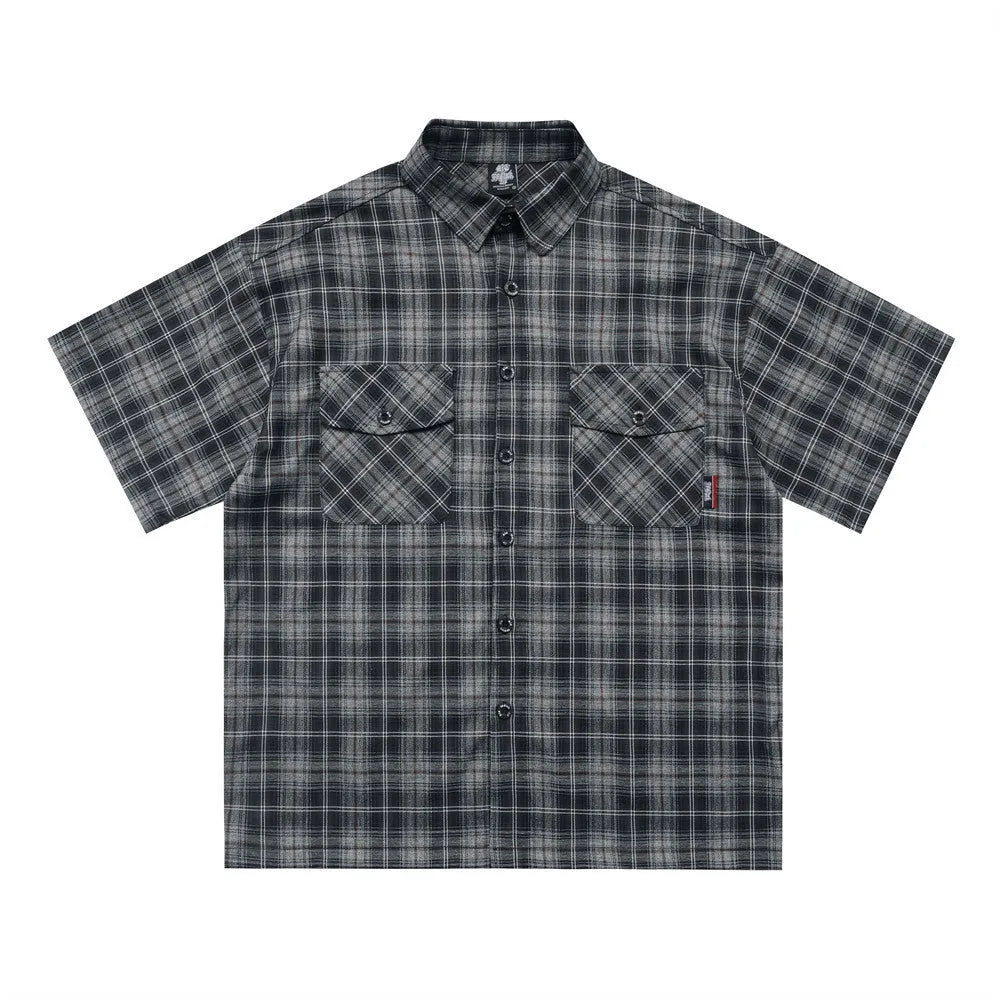 Men's black and brown plaid short sleeve shirt with embroidered lapel detail