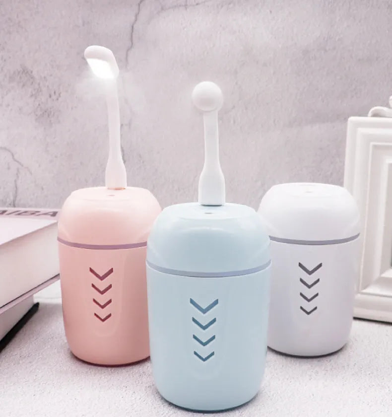 X3 portable car humidifier in columnar design with blue colour option showing mist outlet