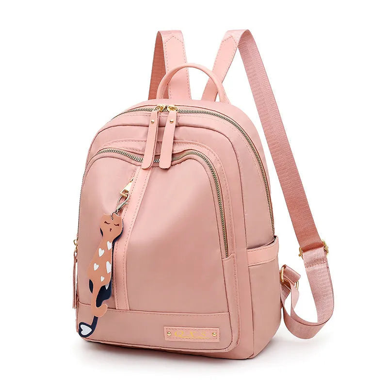Women's black waterproof casual backpack with double shoulder straps and internal organisation compartments