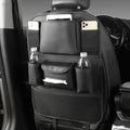 Genuine leather car seat back storage bag in four colour options hanging behind car seat
