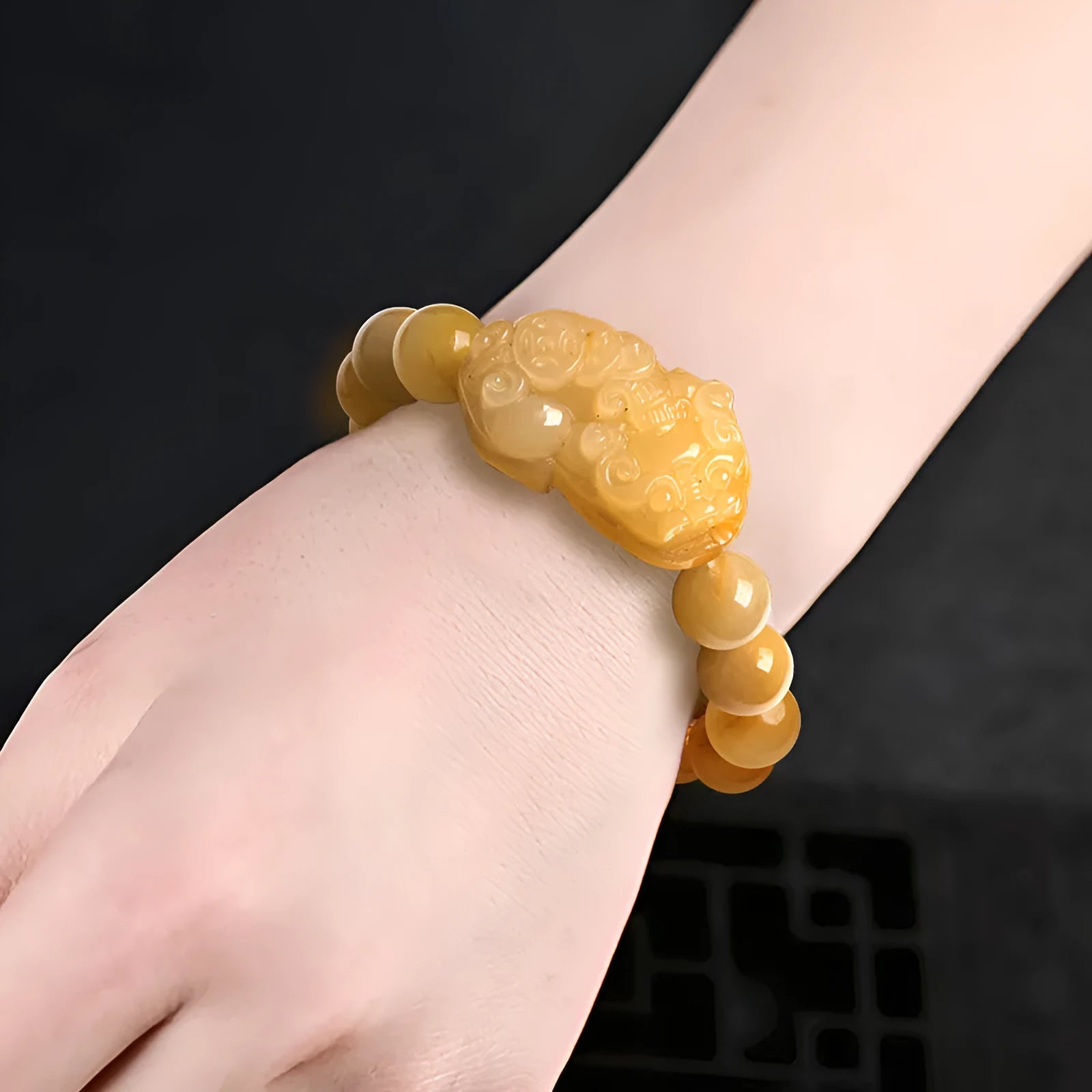Personalised Money Jade Bracelet carved from Golden Thread Jinsi Jade, showing large and small size options.