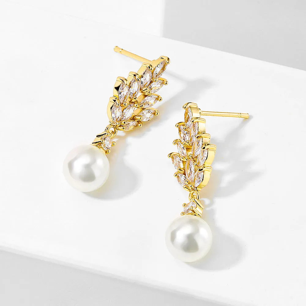 Geometric flower earrings with micro inlaid zircon and pearl detailing in gold plating