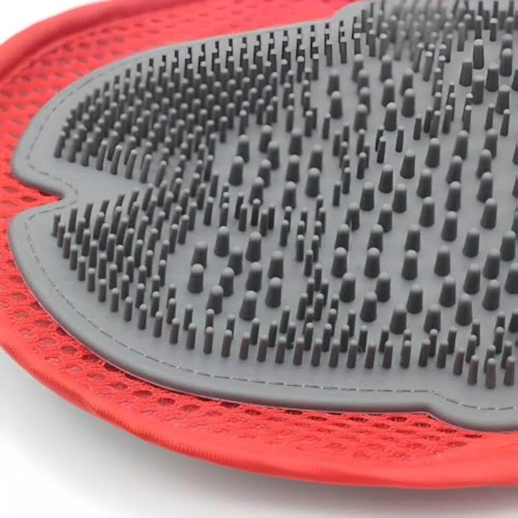 Red pet bathing and grooming glove with an integrated cleaning brush on the palm.