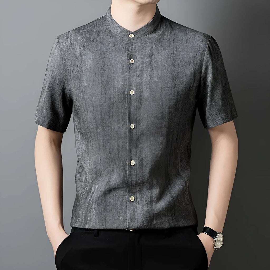Men's loose grey linen cardigan shirt with a stand collar on a hanger.