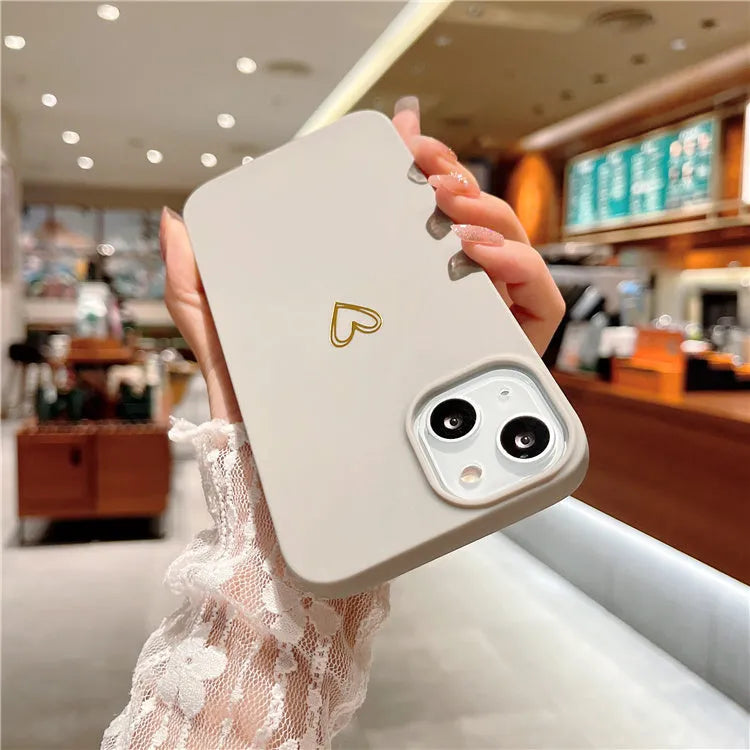 Brown soft silicone iPhone case with hot stamped love design showing non-slip TPU texture