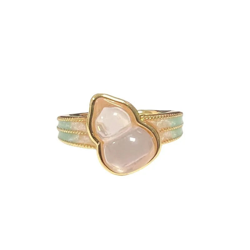 Copper adjustable ring with gourd, flower, and bow design featuring inlaid zircon stones in vintage finish.