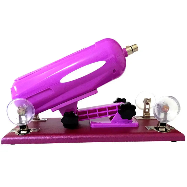 Purple automatic telescopic thrusting sex toy for women on a neutral background