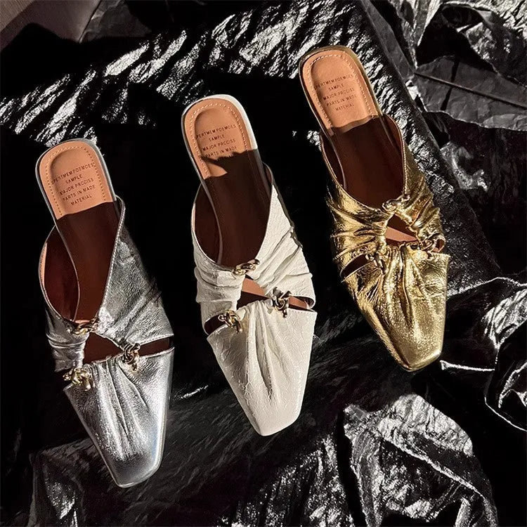 Women's genuine leather half toe cap slippers in silver with square toe and low TPR sole.